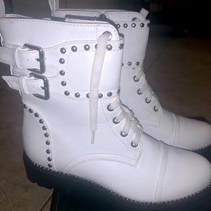Brand new White boots with black bottom and gorgeous studs.